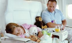Timing flights with nap schedules will give your child a better chance of falling asleep for a good part of the flight.