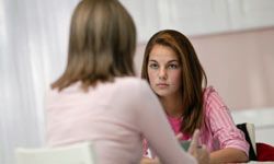 mother and daughter talking