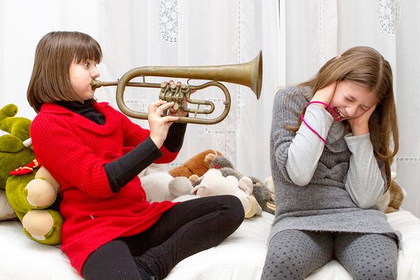 girl playing trumpet