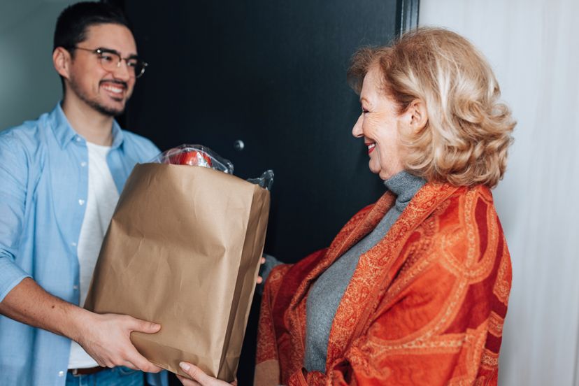 A man helping a woman