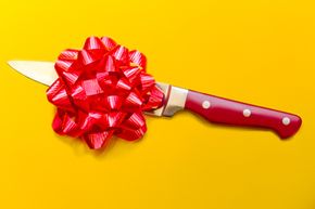 Knife with a gift bow