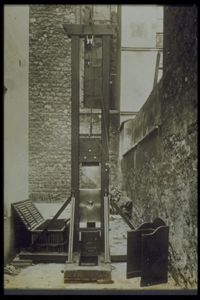 A guillotine in an alley in France, circa 1920