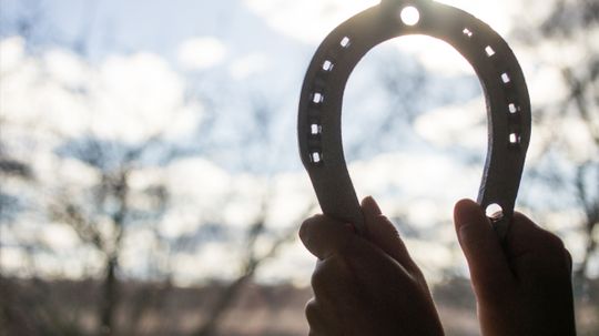 Why are horseshoes considered to be lucky?