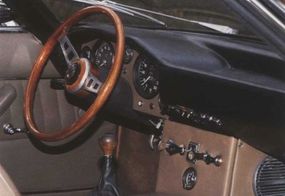 The interior of the Islero featured more headroom than previous modelsand a more subdued but equally adequate instrument panel.