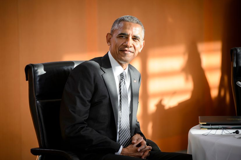 Barack Obama sitting in chair