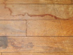 Unlike this wood floor, laminate floors are resistant to stains and damage.