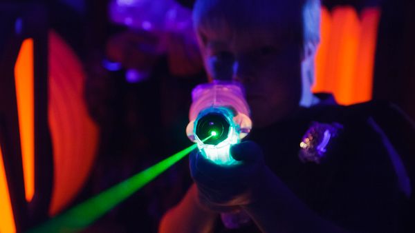 Boy playing laser tag