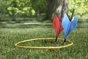 They look innocuous enough parked in the ground, but catch one of those vintage and outlawed (in the U.S.) lawn darts in the noggin, and you might be singing a different tune. Actually, you might not be singing at all. 
