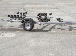 The rollers on this boat trailer make it easier to launch and retrieve a boat without damaging it.