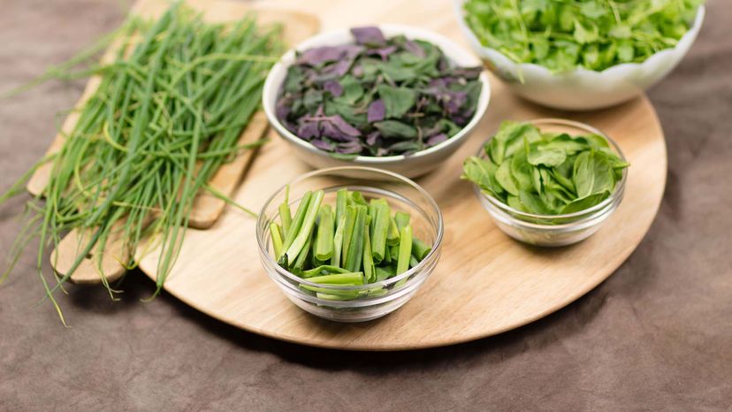 A rotating tray (also called a Lazy Susan) serving green veggies.