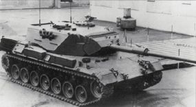 The Leopard 1A3 MBT wears a new, all-welded, spaced-armor turret. Note the wedge-shaped mantlet, distinguished from