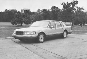 The 1992 Lincoln Town Car was "fully redesigned," yet Town Car loyalists found it similar enough to older models that it enjoyed sales success.”border=