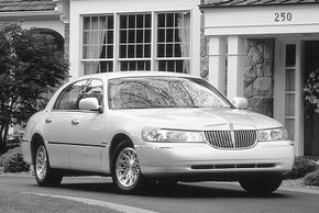 The 1998 Lincoln Town Car redesign was conservative with softly rounded curves and a more upright front aspect.