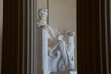 Marble statue stands as international landmark.