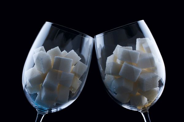 Sugar cubes in wine glass