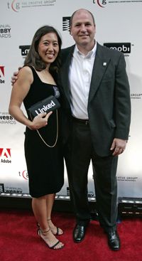 LinkedIn CEO Dan Nye and a guest walk the Webby Awards red carpet on June 5, 2007.