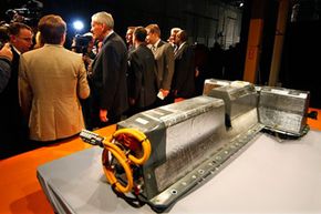 General Motors Chairman and CEO Ed Whitacre addresses the media next to the first lithium-ion battery off the assembly line for the Chevrolet Volt at the Brownstown Battery Pack Assembly in Brownstown Township, Mich., on Jan. 7, 2010.