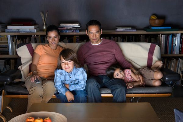 A family watching television together.