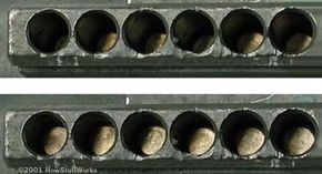 The pins in a pin-and-tumbler lock when no key is inserted (top) and when the correct key is inserted (bottom): When the correct key is inserted, all of the pins are pushed up to the same level, flush with the shear line.