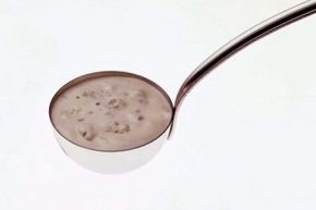 ladle of salad dressing