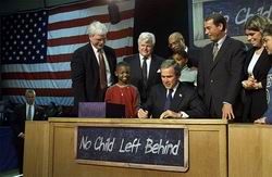 Credit: White House photo by Paul Morse                              President Bush signs into law the No Child Left Behind bill.