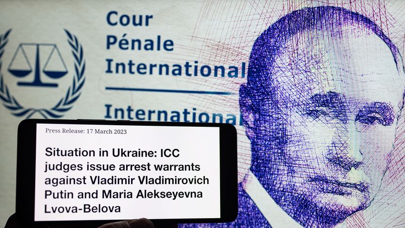 The arrest warrant for Vladimir Putin is seen in the press release from the International Criminal Court in The Hague, March 17, 2023, in Brussels, Belgium. Jonathan Raa/NurPhoto/Getty Images