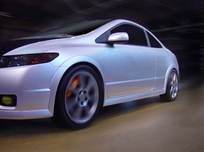 car with orange brake caliper