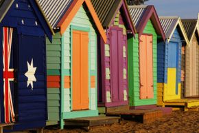 Brightly painted beach huts