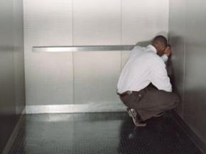 panicking man in elevator