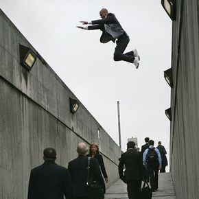 Forrest from Urban Freeflow performs a precision jump for a "Discovery Channel" shoot.”border=