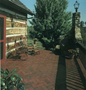 Brick-look quarry tiles laid in a herringbone pattern add dimension and visual interest to terrace edging.