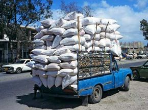 Overloaded transport pictures: If ever a car was going to break