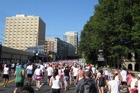 Some of the 55,000 runners of the Peachtree Road Race struggling up Cardiac Hill.