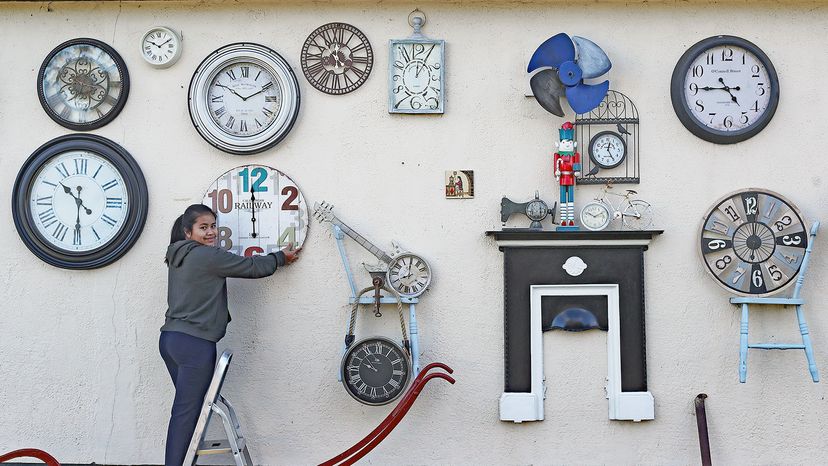 house covered with clocks