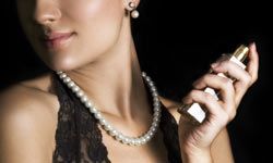 woman spraying herself