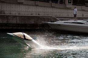 The dolphin-like Seabreacher draws attention on the Chicago River.