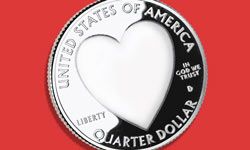 Philanthropy coin with heart on it.