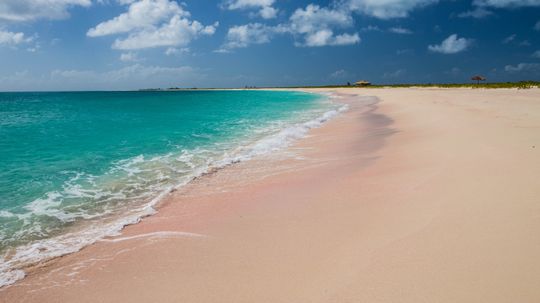 The Enchanting World of Pink Sand Beaches: A Unique Coastal Wonder