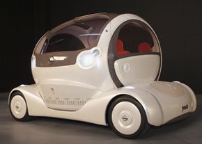 The original Nissan Pivo at its debut in Tokyo. The eco-friendly concept car featured a rotating cockpit, electronic controls and ultra-modern design. See more concept car pictures.