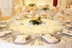 A formally set banquet table.