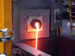 Molten slag draining from a plasma furnace