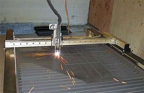 In CNC (computer numerically controlled) cutting, you arrange your shapes on the computer screen and cut them automatically, without having to touch the material.