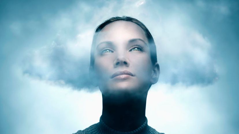 Woman head in the clouds