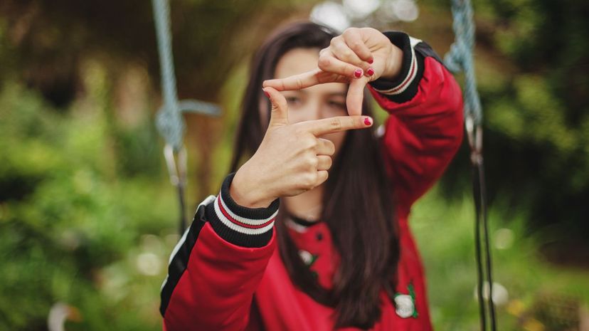 Woman making square frame with fingers