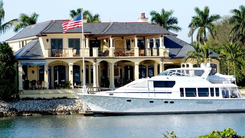 Yacht outside home on the water