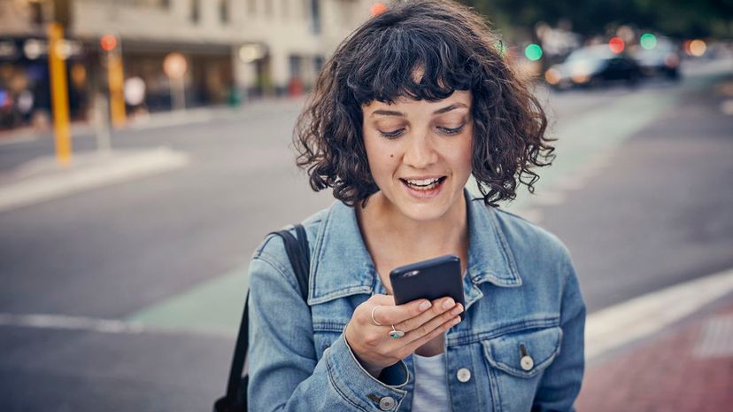 Woman looking at Smartphone