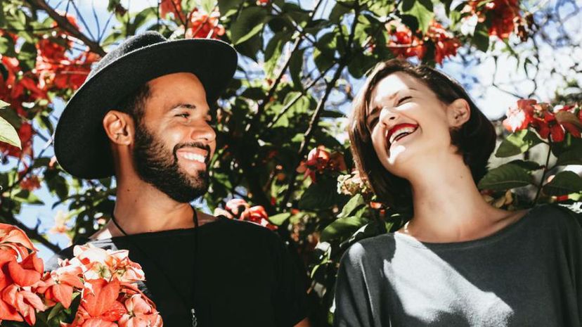 Couple surrounded by flowers