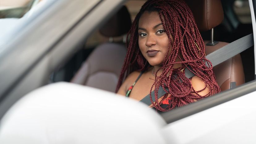 Young woman in car