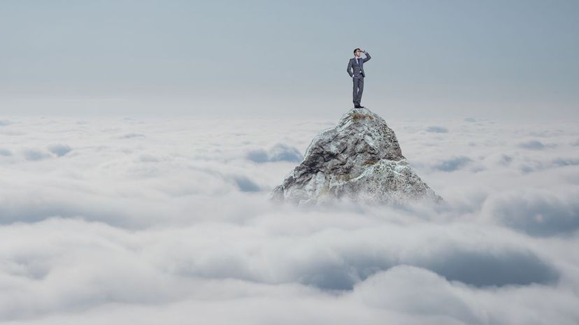 Businessman on a mountain