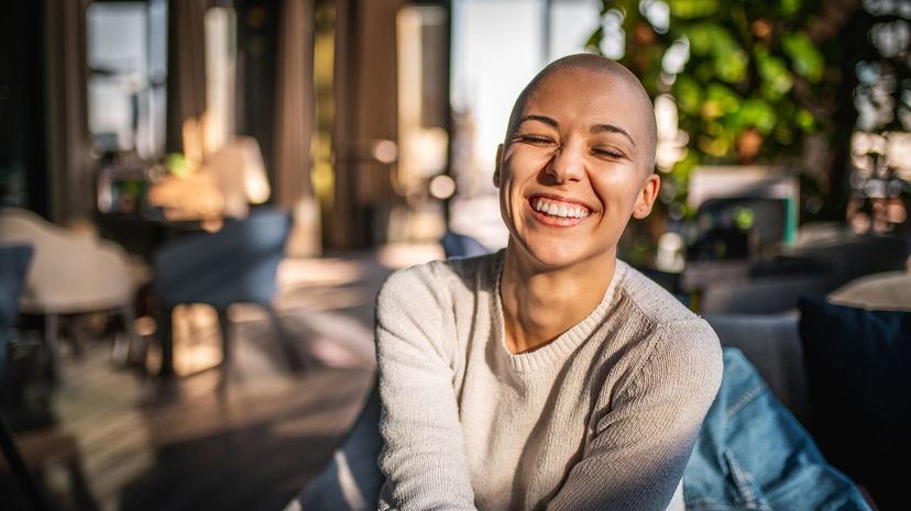 Bald smiling woman